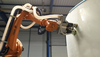 ROBOTIC SANDING OF COMPOSITE MATERIALS